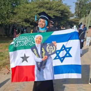 Hargeisa graduate holding the Somaliland and Israel flags together