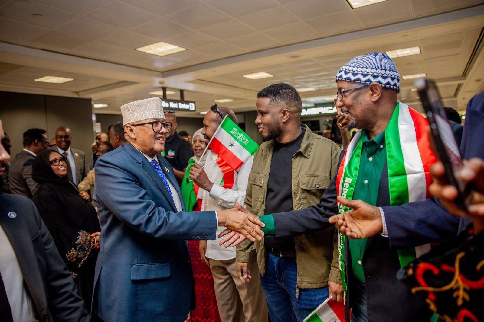 Somaliland-American community members celebrating the President's arrival